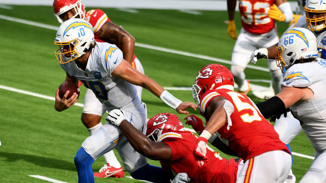 INGLEWOOD, CA - SEPTEMBER 20: Quarterback Justin Herbert #10 of the Los Angeles Chargers scrambles against the Kansas City Chiefs in the second half of a NFL football game at SoFi Stadium in Inglewood on Sunday, September 20, 2020. Kansas City Chiefs won 23-20 in overtime.