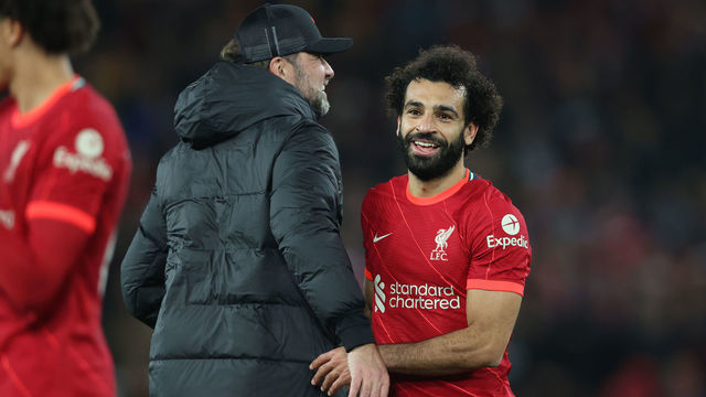 LIVERPOOL, ENGLAND - NOVEMBER 20: Mohamed Salah embraces Juergen Klopp, Manager of Liverpool after their sides victory in the Premier League match between Liverpool and Arsenal at Anfield on November 20, 2021 in Liverpool, England.