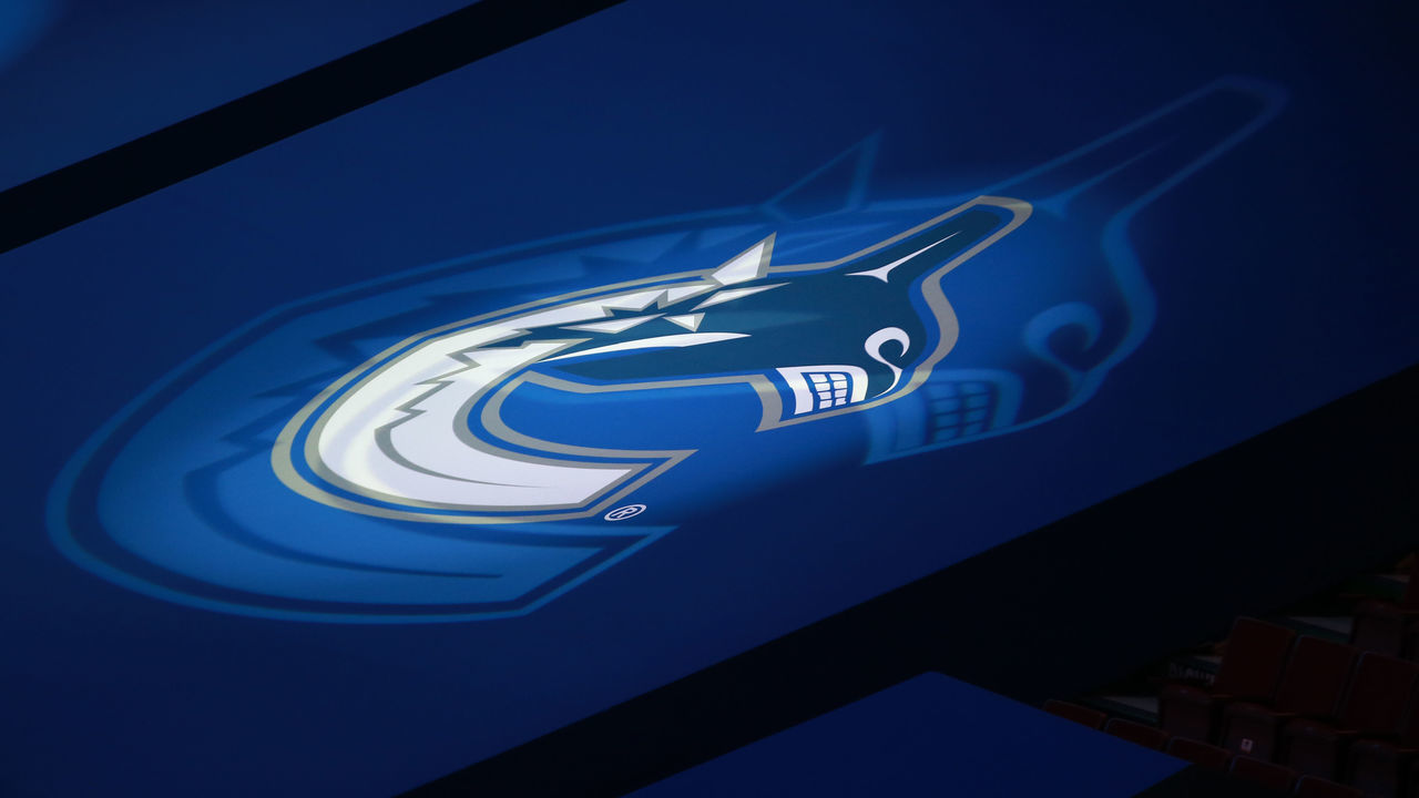 VANCOUVER, BC - FEBRUARY 23: The Vancouver Canucks logo projected on seat coverings inside Rogers Arena before the Canucks play the Edmonton Oilers during their NHL game at Rogers Arena on February 23, 2021 in Vancouver, British Columbia, Canada.