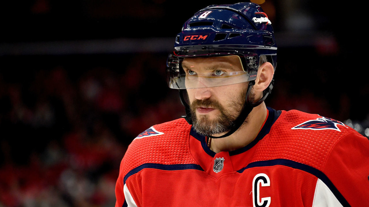WASHINGTON, DC - DECEMBER 10: Capitals left wing Alexander Alex Ovechkin (8) looks with intense eyes as he skates to a face-off during the Pittsburgh Penguins versus Washington Capitals National Hockey League game on December 10, 2021 at Capital One Arena in Washington, D.C..
