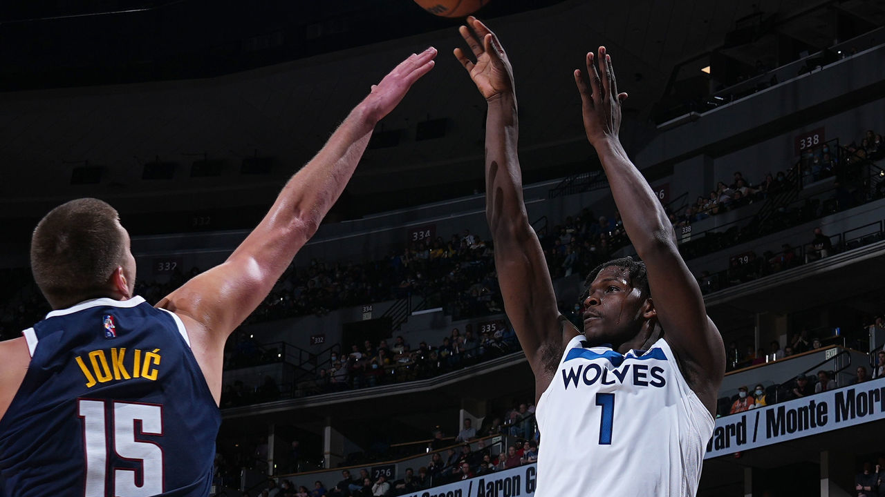DENVER, CO - DECEMBER 15: Anthony Edwards #1 of the Minnesota Timberwolves shoots a three point basket during the game against the Denver Nuggets on December 15, 2021 at the Ball Arena in Denver, Colorado. NOTE TO USER: User expressly acknowledges and agrees that, by downloading and/or using this Photograph, user is consenting to the terms and conditions of the Getty Images License Agreement. Mandatory Copyright Notice: Copyright 2021 NBAE
