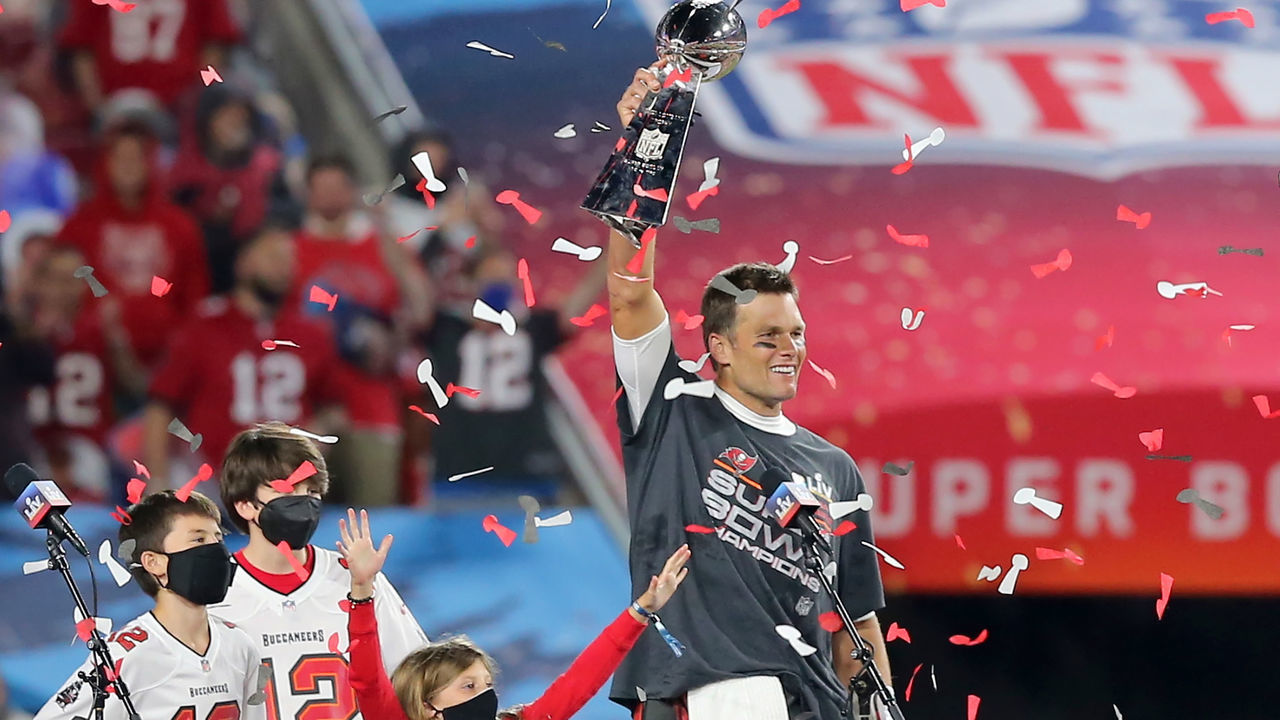 TAMPA, FL - FEBRUARY 07: Super Bowl MVP Tom Brady (12) of the Buccaneers holds the Lombardi Trophy as he is surrounded by his kids Benjamin Brady, John Edward Thomas Moynahan and Vivian Lake Brady after the Super Bowl LV game between the Kansas City Chiefs and the Tampa Bay Buccaneers on February 7, 2021 at Raymond James Stadium, in Tampa, FL.