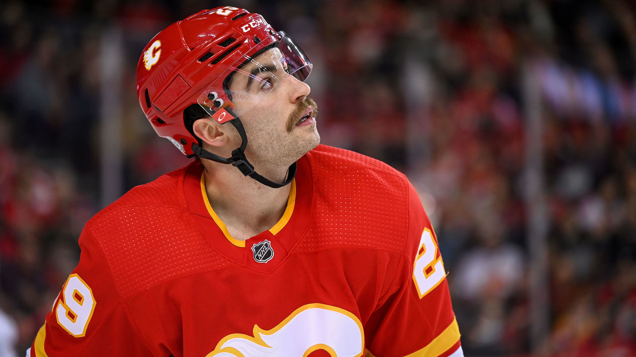 CALGARY, AB - DECEMBER 09: Calgary Flames Winger Dillon Dube (29) looks on after a whistle during the third period of an NHL game where the Calgary Flames hosted the Carolina Hurricanes on December 9, 2021, at the Scotiabank Saddledome in Calgary, AB.