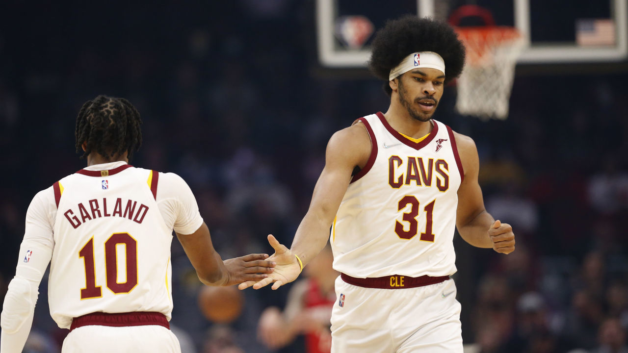 CLEVELAND, OH - DECEMBER 15: Darius Garland #10 of the Cleveland Cavaliers and Jarrett Allen #31 of the Cleveland Cavaliers high five during the game against the Houston Rockets on December 15, 2021 at Rocket Mortgage FieldHouse in Cleveland, Ohio. NOTE TO USER: User expressly acknowledges and agrees that, by downloading and/or using this Photograph, user is consenting to the terms and conditions of the Getty Images License Agreement. Mandatory Copyright Notice: Copyright 2021 NBAE