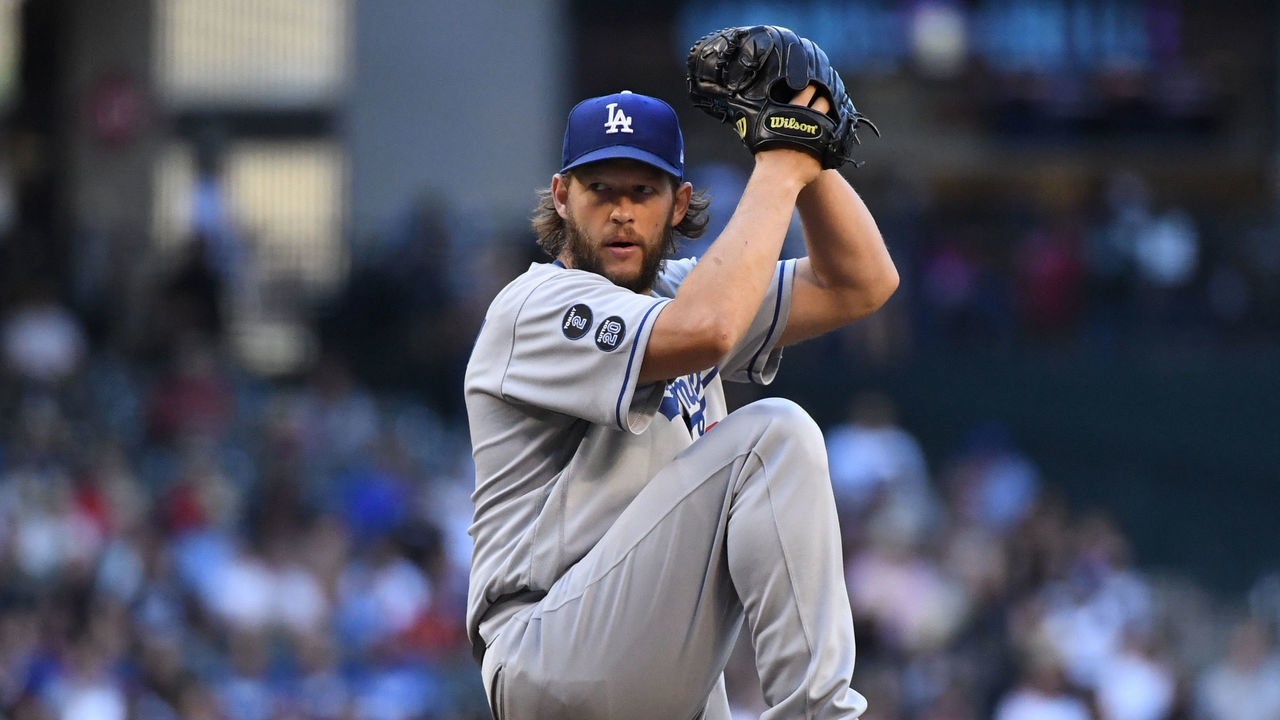 PHOENIX, ARIZONA - SEPTEMBER 25: Clayton Kershaw #22 of the Los Angeles Dodgers delivers a pitch against the Arizona Diamondbacks at Chase Field on September 25, 2021 in Phoenix, Arizona.