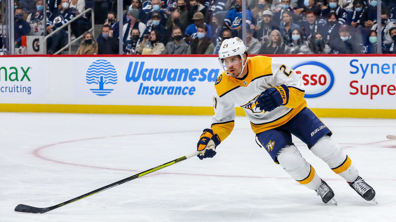 WINNIPEG, MB - OCTOBER 23: Nick Cousins #21 of the Nashville Predators follows the play up the ice during second period action against the Winnipeg Jets at the Canada Life Centre on October 23, 2021 in Winnipeg, Manitoba, Canada.