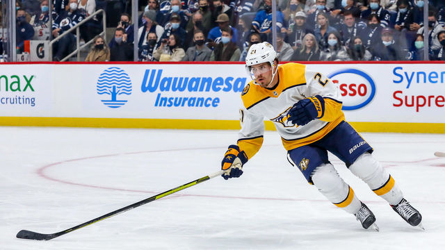 WINNIPEG, MB - OCTOBER 23: Nick Cousins #21 of the Nashville Predators follows the play up the ice during second period action against the Winnipeg Jets at the Canada Life Centre on October 23, 2021 in Winnipeg, Manitoba, Canada.