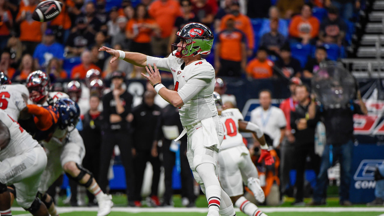 SAN ANTONIO, TX - DECEMBER 03: Western Kentucky Hilltoppers quarterback Bailey Zappe (4) throws downfield during the football game between the Western Kentucky Hilltoppers and UTSA Roadrunners at the Alamodome on December 3, 2021 in San Antonio, Texas.