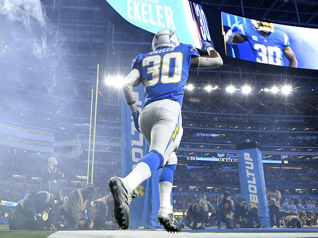 INGLEWOOD, CALIFORNIA - DECEMBER 16: Austin Ekeler #30 of the Los Angeles Chargers enters the field before the game before the game against the Kansas City Chiefs at SoFi Stadium on December 16, 2021 in Inglewood, California.