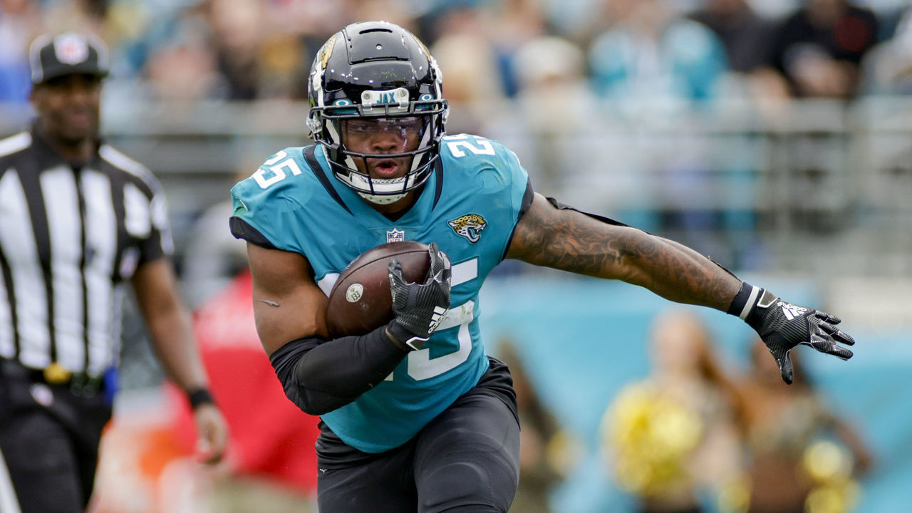 JACKSONVILLE, FL - NOVEMBER 28: Jacksonville Jaguars running back James Robinson (25) runs during the game between the Atlanta Falcons and the Jacksonville Jaguars on November 28, 2021 at TIAA Bank Field in Jacksonville, Fl.