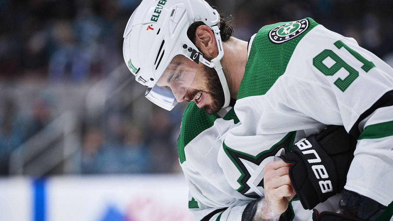 SAN JOSE, CA - DECEMBER 11: Dallas Stars center Tyler Seguin (91) winces in pain during the NHL game between the San Jose Sharks and the Dallas Stars on December 11, 2021 at SAP Center in San Jose, CA.
