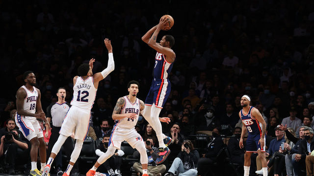 NEW YORK, NEW YORK - DECEMBER 16: Kevin Durant #7 of the Brooklyn Nets shoots against Tobias Harris #12 of the Philadelphia 76ers during their game at Barclays Center on December 16, 2021 in New York City.