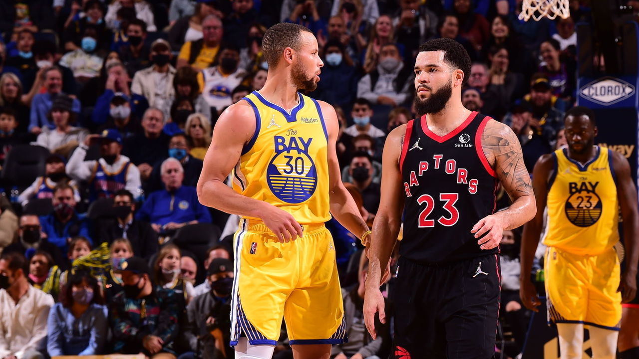SAN FRANCISCO, CA - NOVEMBER 21: Stephen Curry #30 of the Golden State Warriors and Fred VanVleet #23 of the Toronto Raptors looks on during the game on November 21, 2021 at Chase Center in San Francisco, California. NOTE TO USER: User expressly acknowledges and agrees that, by downloading and or using this photograph, user is consenting to the terms and conditions of Getty Images License Agreement. Mandatory Copyright Notice: Copyright 2021 NBAE