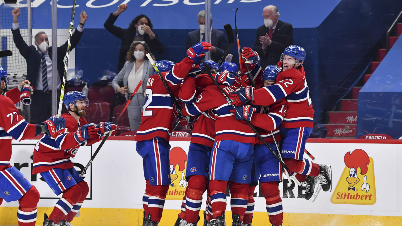 MONTREAL, QC - JUNE 07: The Montreal Canadiens celebrate an overtime victory against the Winnipeg Jets in Game Four of the Second Round of the 2021 Stanley Cup Playoffs at the Bell Centre on June 7, 2021 in Montreal, Canada. The Montreal Canadiens defeated the Winnipeg Jets 3-2 in overtime and eliminated them with a 4-0 series win.