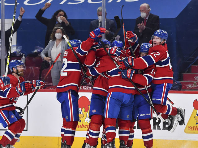 MONTREAL, QC - JUNE 07: The Montreal Canadiens celebrate an overtime victory against the Winnipeg Jets in Game Four of the Second Round of the 2021 Stanley Cup Playoffs at the Bell Centre on June 7, 2021 in Montreal, Canada. The Montreal Canadiens defeated the Winnipeg Jets 3-2 in overtime and eliminated them with a 4-0 series win.