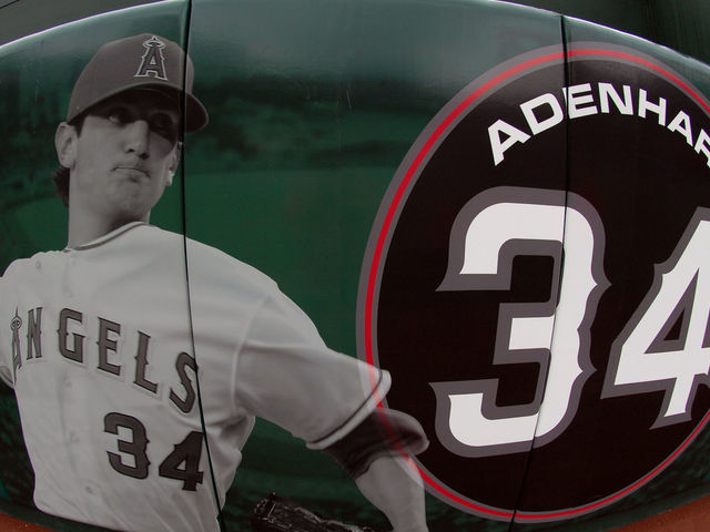 April 10, 2009; Los Angeles Angels of Anaheim pitcher Nick Adenhart, who was killed with two others by a suspected drunk driver, photograph and number are put on the wall in center field before a game against the Boston Red Sox at Angel Stadium.