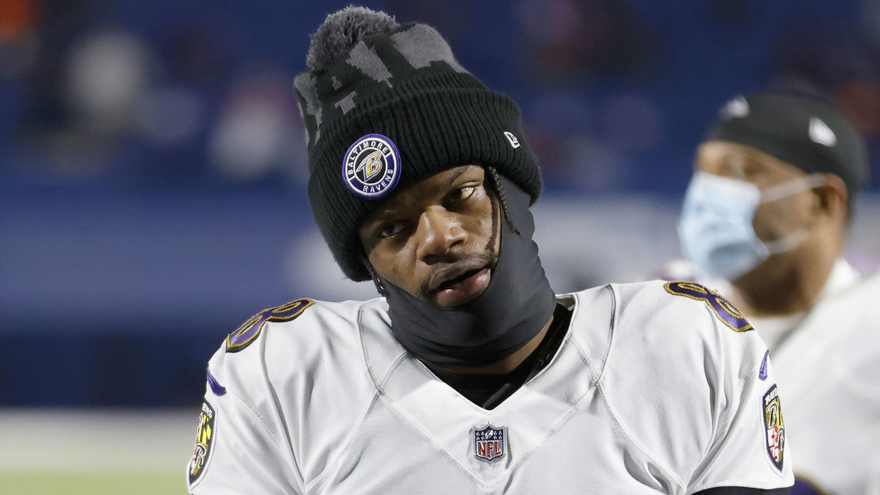 ORCHARD PARK, NEW YORK - JANUARY 16: Lamar Jackson #8 of the Baltimore Ravens walks off the field after the second quarter of an AFC Divisional Playoff game against the Buffalo Bills at Bills Stadium on January 16, 2021 in Orchard Park, New York.