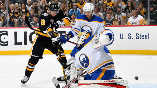 PITTSBURGH, PA - DECEMBER 17: Malcolm Subban #47 of the Buffalo Sabres makes a save on Evan Rodrigues #9 of the Pittsburgh Penguins at PPG PAINTS Arena on December 17, 2021 in Pittsburgh, Pennsylvania.