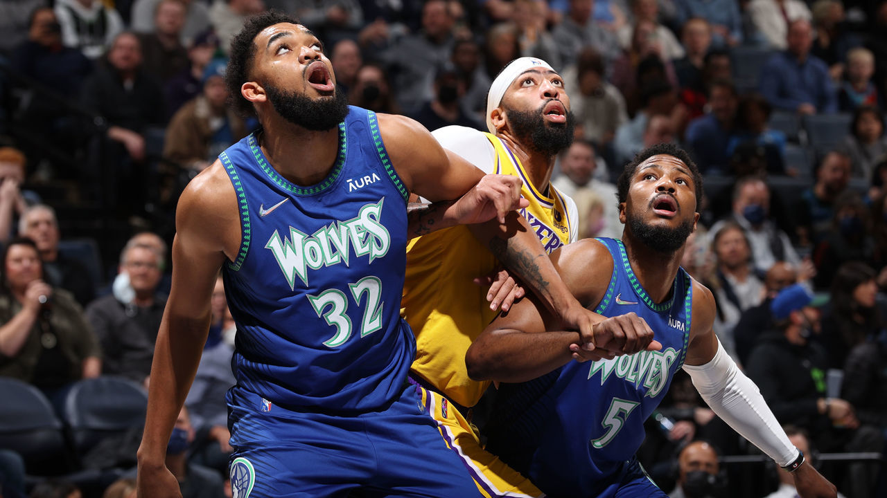 MINNEAPOLIS, MN - DECEMBER 17: Anthony Davis #3 of the Los Angeles Lakers fights for position with Karl-Anthony Towns #32 and Malik Beasley #5 of the Minnesota Timberwolves during the game on December 17, 2021 at Target Center in Minneapolis, Minnesota. Mandatory Copyright Notice: Copyright 2021 NBAE