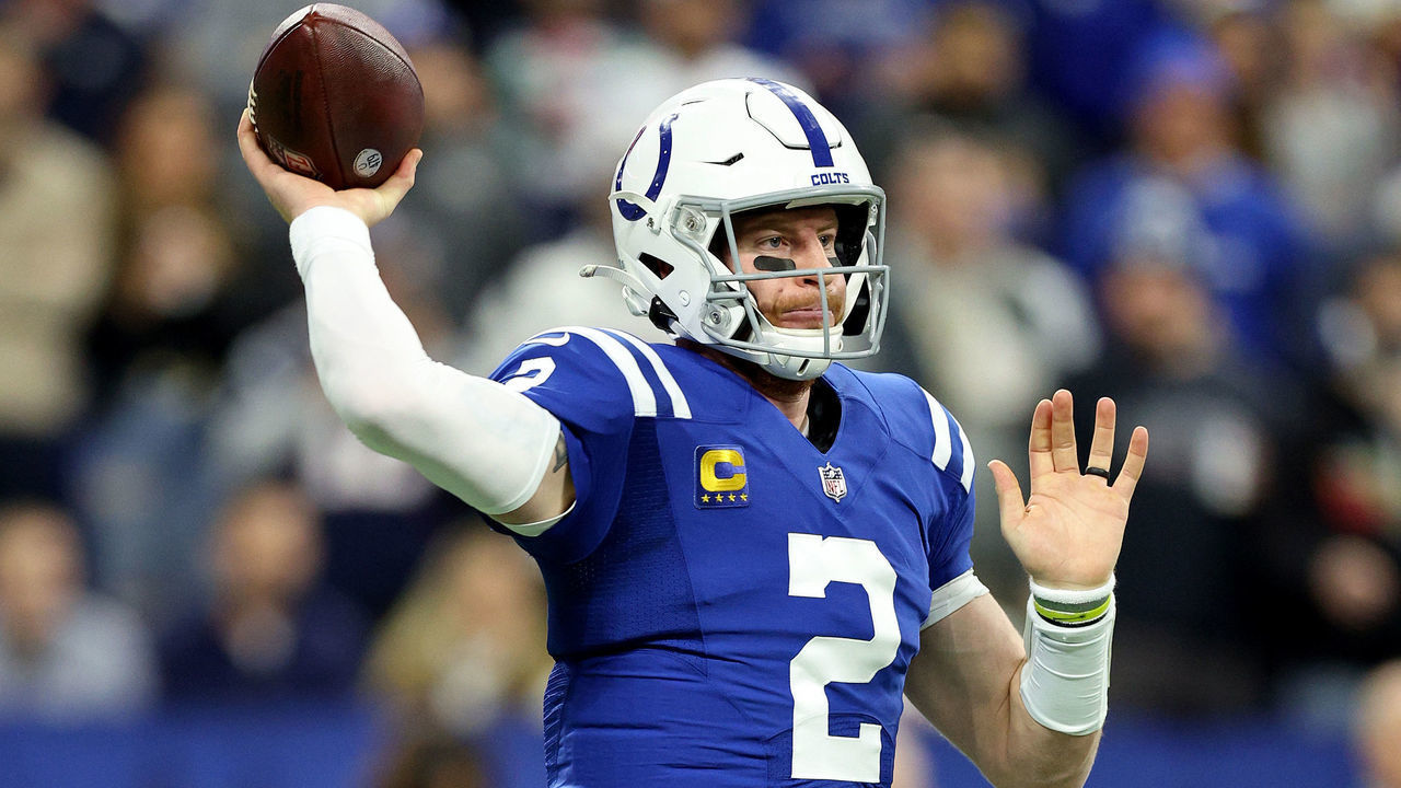 INDIANAPOLIS, INDIANA - DECEMBER 18: Carson Wentz #2 of the Indianapolis Colts looks to pass during the first quarter against the New England Patriots at Lucas Oil Stadium on December 18, 2021 in Indianapolis, Indiana.