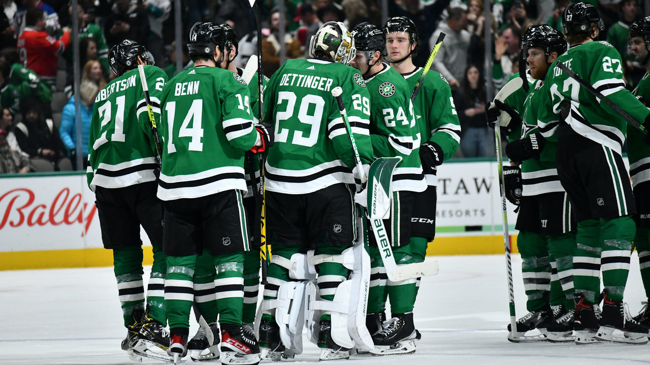DALLAS, TX - DECEMBER 18: Jake Oettinger #29 of the Dallas Stars is congratulated on a win against the Chicago Blackhawks at the American Airlines Center on December 18, 2021 in Dallas, Texas.