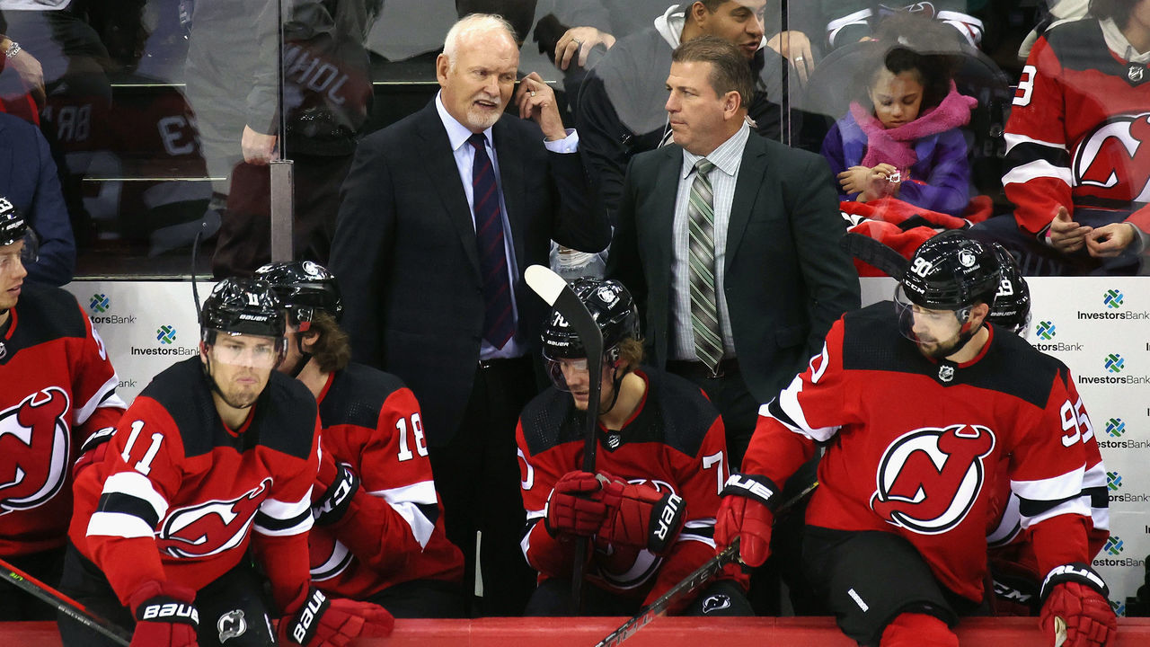 NEWARK, NEW JERSEY - NOVEMBER 09: (L-R) Lindy Ruff and Mark Reechi of the New Jersey Devils handle bench duties against the Florida Panthers at the Prudential Center on November 09, 2021 in Newark, New Jersey.