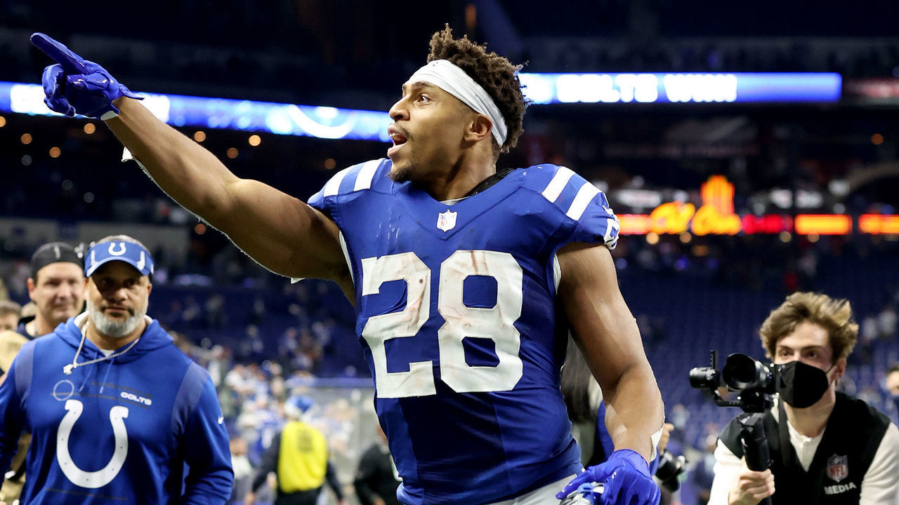 INDIANAPOLIS, INDIANA - DECEMBER 18: Jonathan Taylor #28 of the Indianapolis Colts runs off the field after a win against the New England Patriots at Lucas Oil Stadium on December 18, 2021 in Indianapolis, Indiana.