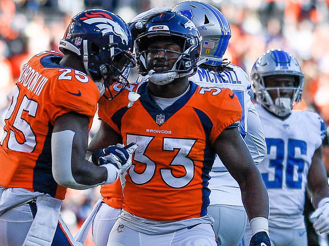 DENVER, CO - DECEMBER 12: Denver Broncos running back Melvin Gordon (25) celebrates with running back Javonte Williams (33) after a first quarter Gordon touchdown during a game between the Denver Broncos and the Detroit Lions at Empower Field at Mile High on December 12, 2021 in Denver, Colorado.