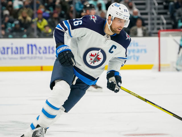 SEATTLE, WASHINGTON - DECEMBER 09: Blake Wheeler #26 of the Winnipeg Jets chases after the puck on defense during the third period of a game between the Winnipeg Jets and the Seattle Kraken at Climate Pledge Arena on December 09, 2021 in Seattle, Washington.