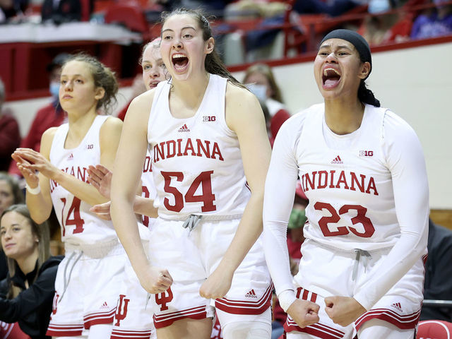 BLOOMINGTON, INDIANA - DECEMBER 09: Mackenzie Holmes #54 and Kiandra Browne #23 of the Indiana Hoosiers celebrate during the game against the Fairfield Stags at Simon Skjodt Assembly Hall on December 09, 2021 in Bloomington, Indiana.
