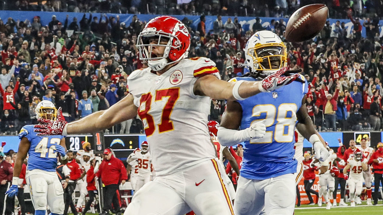 Inglewood, CA, Thursday, December 16, 2021 - Kansas City Chiefs tight end Travis Kelce (87) scores the game winning touchdown in overtime past Los Angeles Chargers cornerback Davontae Harris (28) at SoFi Stadium. (Robert Gauthier/Los Angeles Times via Getty Images)