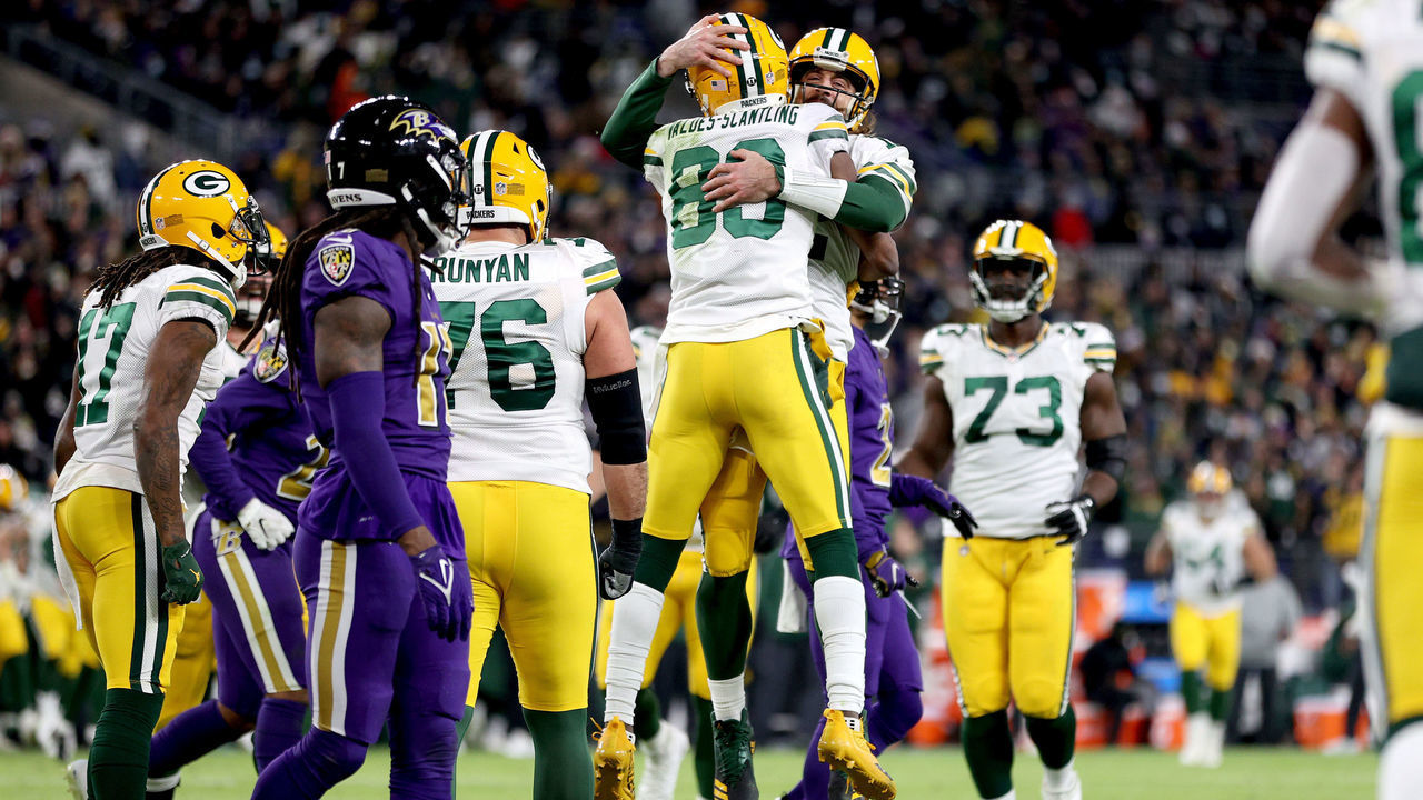 BALTIMORE, MARYLAND - DECEMBER 19: Marquez Valdes-Scantling #83 and Aaron Rodgers #12 of the Green Bay Packers celebrate Valdes-Scantling's receiving touchdown against the Baltimore Ravens in the fourth quarter at M&T Bank Stadium on December 19, 2021 in Baltimore, Maryland.