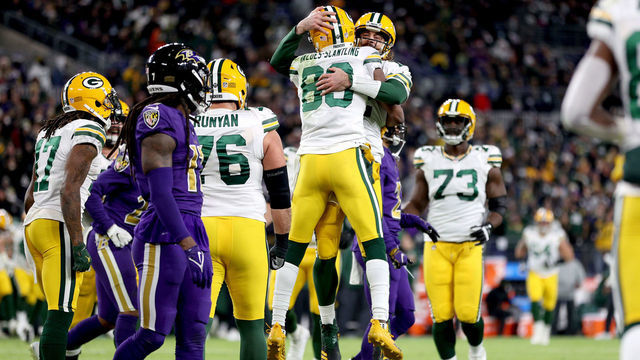 BALTIMORE, MARYLAND - DECEMBER 19: Marquez Valdes-Scantling #83 and Aaron Rodgers #12 of the Green Bay Packers celebrate Valdes-Scantling's receiving touchdown against the Baltimore Ravens in the fourth quarter at M&T Bank Stadium on December 19, 2021 in Baltimore, Maryland.