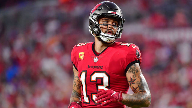 TAMPA, FLORIDA - DECEMBER 12: Mike Evans #13 of the Tampa Bay Buccaneers looks back during the first half against the Buffalo Bills at Raymond James Stadium on December 12, 2021 in Tampa, Florida.
