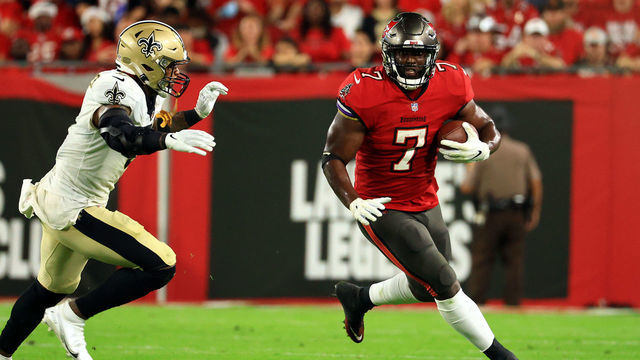 TAMPA, FLORIDA - DECEMBER 19: Leonard Fournette #7 of the Tampa Bay Buccaneers carries the ball during the 2nd quarter of the game against the New Orleans Saints at Raymond James Stadium on December 19, 2021 in Tampa, Florida.
