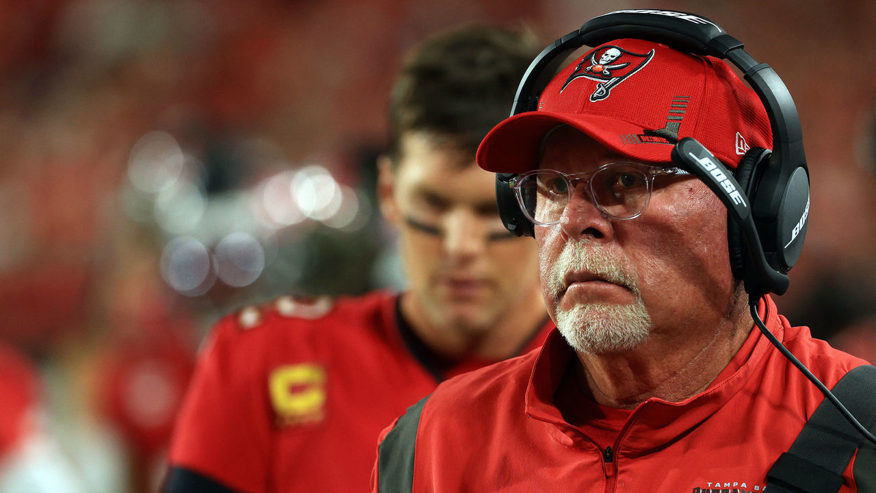 TAMPA, FLORIDA - DECEMBER 19: Head coach Bruce Arians and quarterback Tom Brady #12 of the Tampa Bay Buccaneers watch from the sidelines during the game against the New Orleans Saints at Raymond James Stadium on December 19, 2021 in Tampa, Florida.