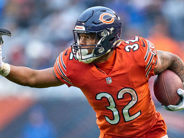CHICAGO, IL - DECEMBER 05: Chicago Bears running back David Montgomery (32) battles with Arizona Cardinals outside linebacker Jordan Hicks (58) during a game between the Arizona Cardinals and the Chicago Bears on December 5, 2021 at Soldier Stadium, in Chicago, IL.