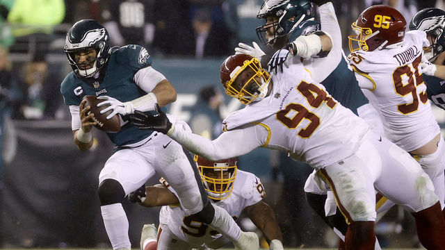 PHILADELPHIA, PENNSYLVANIA - DECEMBER 21: Jalen Hurts #1 of the Philadelphia Eagles rushes with the ball during the third quarter against the Washington Football Team at Lincoln Financial Field on December 21, 2021 in Philadelphia, Pennsylvania.