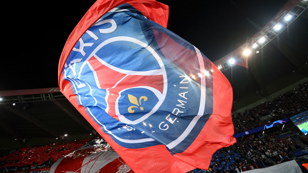 PARIS, FRANCE - SEPTEMBER 28: A Paris Saint-Germain flag is flown prior to the UEFA Champions League group A match between Paris Saint-Germain and Manchester City at Parc des Princes on September 28, 2021 in Paris, France.