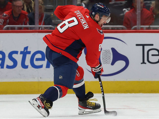 WASHINGTON, DC - DECEMBER 19: Alex Ovechkin #8 of the Washington Capitals steps into a shot during a game against the Los Angeles Kings at Capital One Arena on December 19, 2021 in Washington, D.C.