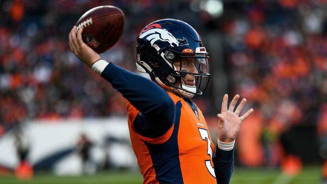 DENVER, CO - DECEMBER 19: Denver Broncos quarterback Drew Lock (3) warms up before coming into the game after an injury to quarterback Teddy Bridgewater (5) (not pictured) during a game between the Denver Broncos and the Cincinnati Bengals at Empower Field at Mile High on December 19, 2021 in Denver, Colorado.