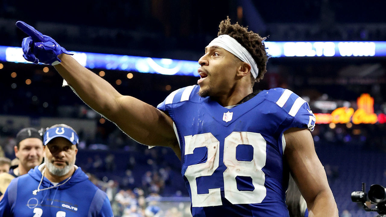 INDIANAPOLIS, INDIANA - DECEMBER 18: Jonathan Taylor #28 of the Indianapolis Colts runs off the field after a win against the New England Patriots at Lucas Oil Stadium on December 18, 2021 in Indianapolis, Indiana.