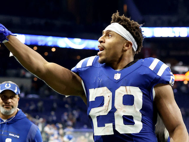 INDIANAPOLIS, INDIANA - DECEMBER 18: Jonathan Taylor #28 of the Indianapolis Colts runs off the field after a win against the New England Patriots at Lucas Oil Stadium on December 18, 2021 in Indianapolis, Indiana.