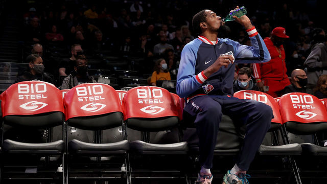 NEW YORK, NEW YORK - DECEMBER 03: Kevin Durant #7 of the Brooklyn Nets sits on the bench during warm ups before the game against the Minnesota Timberwolves at Barclays Center on December 03, 2021 in the Brooklyn borough of New York City.