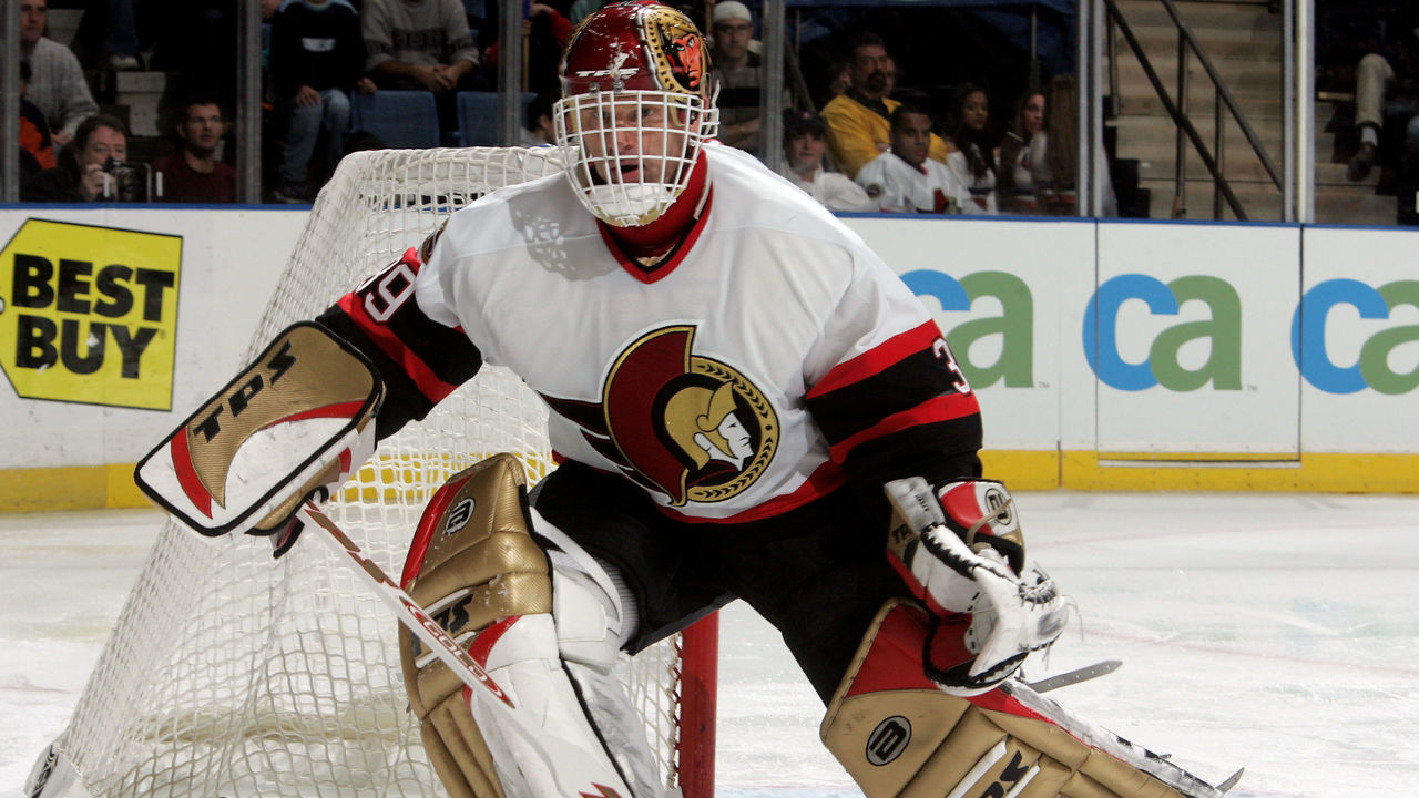 UNIONDALE, NY - NOVEMBER 25: Goaltender Dominik Hasek #39 of the Ottawa Senators looks to play the puck against the New York Islanders during their game on November 25, 2005 at Nassau Coliseum in Uniondale, New York. The Sens defeated the Isles 6-2.