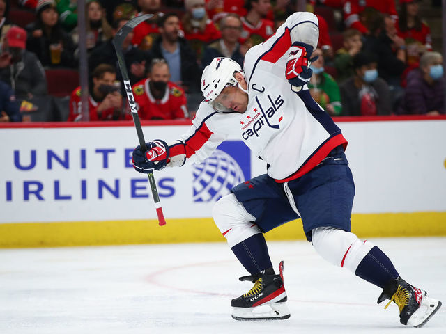 CHICAGO, IL - DECEMBER 15: Washington Capitals Left Wing Alex Ovechkin (8) celebrates after scoring a goal during a game between the Chicago Blackhawks and the Washington Capitals on December 15, 2021 at the United Center in Chicago, IL.