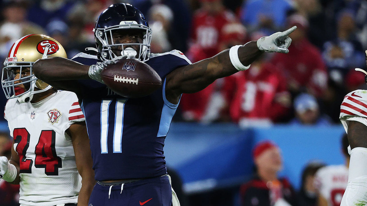 NASHVILLE, TENNESSEE - DECEMBER 23: A.J. Brown #11 of the Tennessee Titans reacts after a first down reception during the third quarter against the San Francisco 49ers at Nissan Stadium on December 23, 2021 in Nashville, Tennessee.