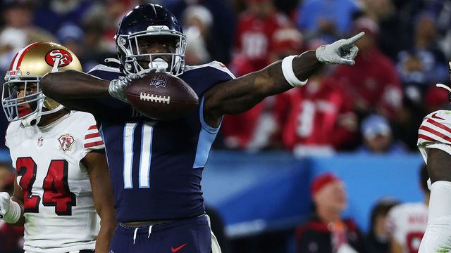 NASHVILLE, TENNESSEE - DECEMBER 23: A.J. Brown #11 of the Tennessee Titans reacts after a first down reception during the third quarter against the San Francisco 49ers at Nissan Stadium on December 23, 2021 in Nashville, Tennessee.