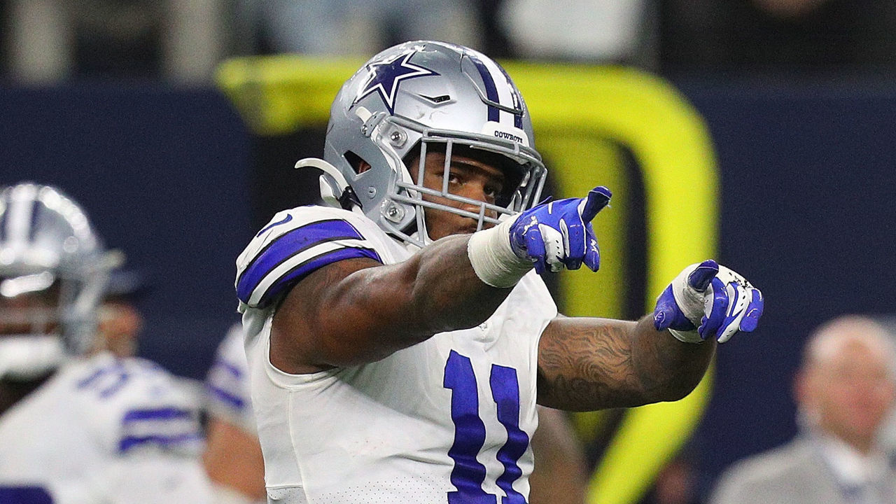 ARLINGTON, TEXAS - SEPTEMBER 27: Micah Parsons #11 of the Dallas Cowboys celebrates a sack of Jalen Hurts of the Philadelphia Eagles in the second half of a football game at AT&T Stadium on September 27, 2021 in Arlington, Texas.