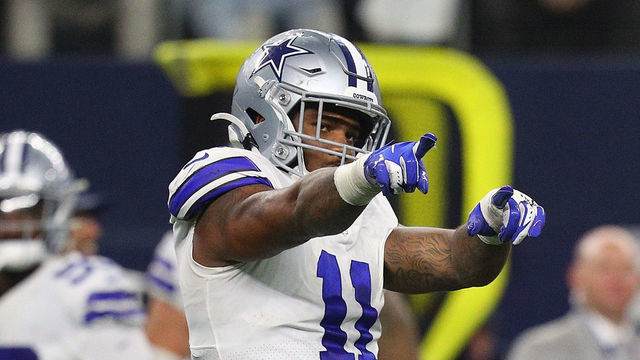ARLINGTON, TEXAS - SEPTEMBER 27: Micah Parsons #11 of the Dallas Cowboys celebrates a sack of Jalen Hurts of the Philadelphia Eagles in the second half of a football game at AT&T Stadium on September 27, 2021 in Arlington, Texas.